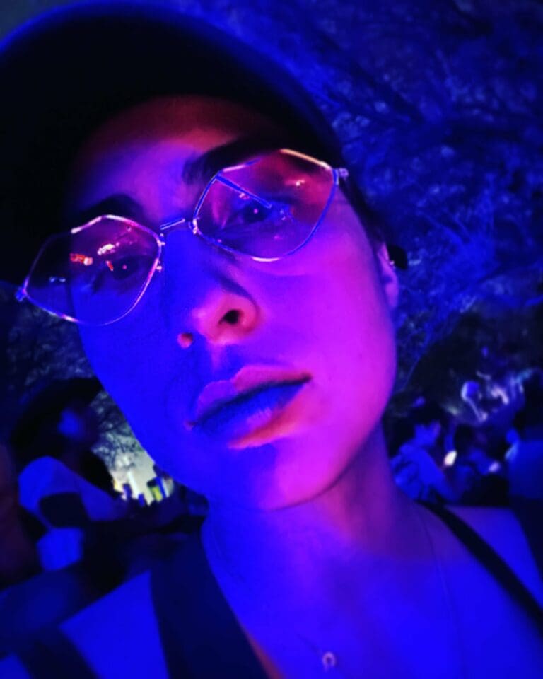 dj face with blue and purple lights
