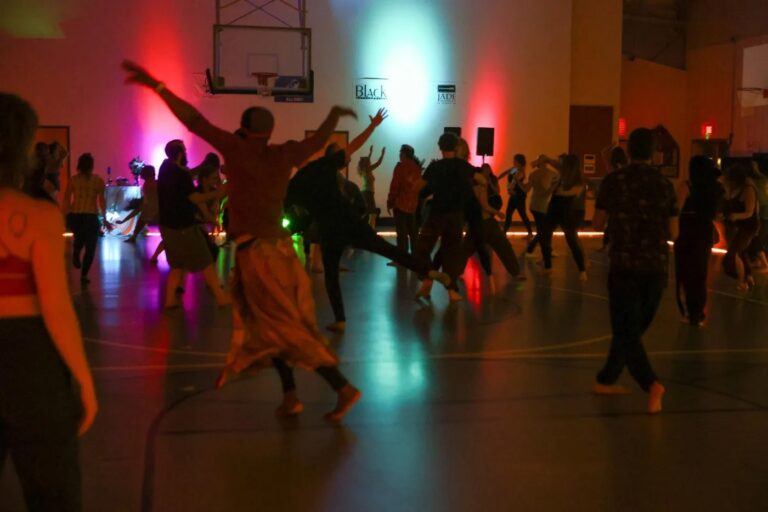 Dancer's joyful feet with mood lighting
